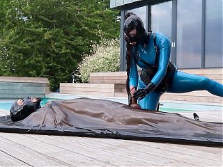 Cristal Kinky in latex catsuit – handjob and sex with bound sub in latex vacbed Preview 